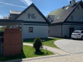 48C Domki letniskowe i apartament, beach rental in Pobierowo