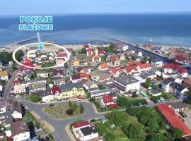 Domki i POKOJE PLAŻOWE, Hotel in Darłówko