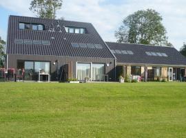 Luxury holiday home with private terrace, hotel de luxe a Langweer