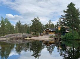 Luxury Holiday Home with Private Lake, Ferienunterkunft in Vehmaa