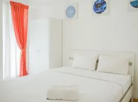 Spacious and Elegant 2BR M-Town Serpong Apartment By Travelio