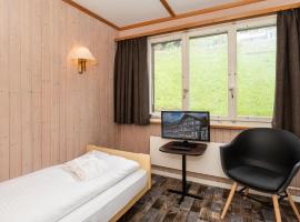 Basic Rooms Jungfrau Lodge, hotel di Grindelwald