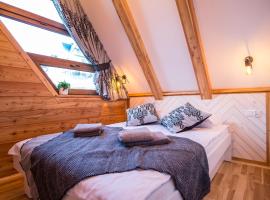 Domek & Apartament Na Ogrodzie, Hotel in Suche