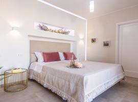HYPNOTIC GUESTHOUSE, bed and breakfast en Budoni