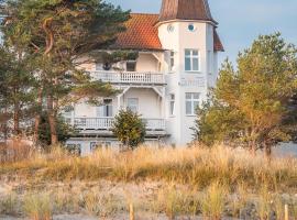 Strandhotel zur Promenade, отель в городе Бинц, рядом находится Binz Station