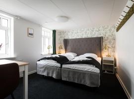 Diagonalkroen, bed and breakfast en Give