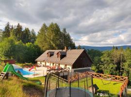 Chalupa Barborka - Národní park Krkonoše, sauna, bazén, dětské hřiště, gril, 6 pokojů, kuchyň, společenská místnost s krbem, cottage sa Vrchlabí
