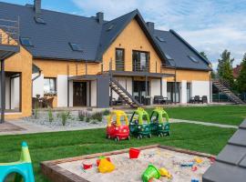 Róża Bałtyku - Apartamenty i Pokoje, homestay in Dębki