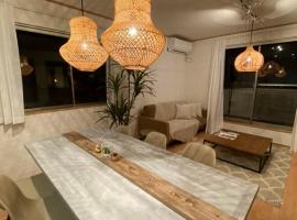 #オーシャンビューBBQ可能 #4LDK新築一軒家 #長期滞在歓迎 -- 時空間 凪 Nagi --, villa in Hyakuna