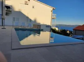 Apartment 1 with pool and amazing sea view
