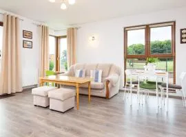 Zatoka Pucka - Wakacyjny Apartament z ogródkiem by Noclegi Renters