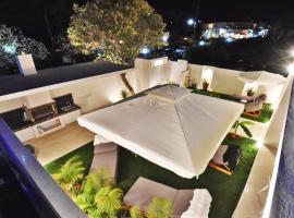 4 Elements Seaside Luxury Suites by RentalsPro Nea Moudania Halkidiki, hotel in Nea Moudania