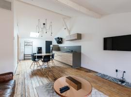 Appartement spacieux et lumineux avec climatisation et belle hauteur sous plafond - Halle 2EME, huoneisto kohteessa Castillon-la-Bataille