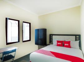 Super OYO 3354 Homia Residence, hotel with parking in Mencil