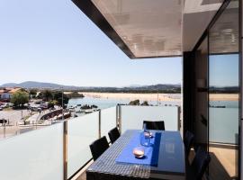 Apartamentos Playa De Los Barcos, hotel em Isla