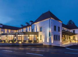 Hôtel & Spa Les Sept Fontaines Best Western Premier、トゥールニュのホテル