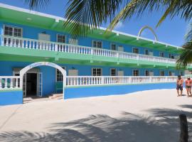 Rainbow Hotel, hotel med parkering i Caye Caulker