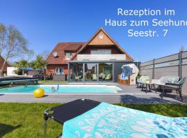 Ferienwohnung Haus zum Seehund mit Pool, hotel in Bensersiel