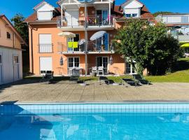 Das Schneckenhaus - Ferienwohnung mit Pool & Seeblick, hotel la plajă din Bodman-Ludwigshafen