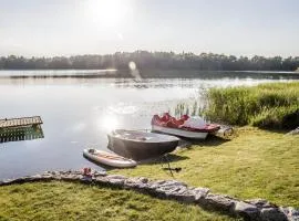 Dom nad jeziorem Ublik z sauną i jacuzzi