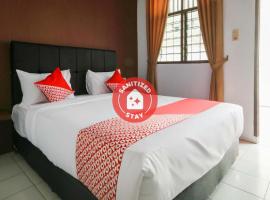 OYO 2940 Papakoel Guest House, hotel di Medan