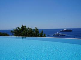Seethrough Mykonos Suites – hotel w pobliżu miejsca Klub plażowy Scorpios Mykonos w mieście Platis Gialos Mykonos