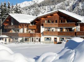 Hotel Bouton D'Or - Cogne โรงแรมในกอนเญ