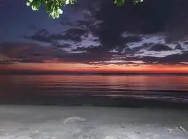 Bella's Beach Resort 2-bedroom Cottage 1 large bedroom with aircon and 1 small maids type room with fan