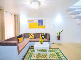 Charming Modern 2-Bedroom Apartment, Olongapo City Center、オロンガポのアパートメント