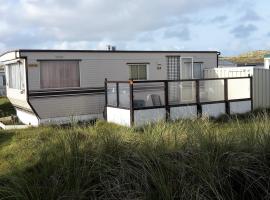 AMELAND-Nes-Duinoord: Stacaravan (chalet) + fietsen direct aan zee!, cabin nghỉ dưỡng ở Nes