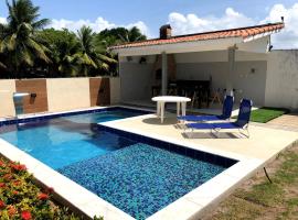Casa completa com piscina e área de laser completa na praia BELA - PB, hotel in Pitimbu