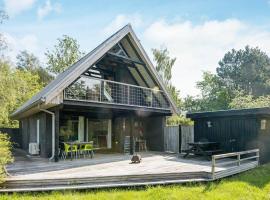 Three-Bedroom Holiday home in Knebel 28, casa de férias em Skødshoved Strand