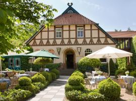 Hotel zur Kloster-Mühle, hotel amb aparcament a Groß Meckelsen