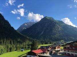 Groot appartement in Aparthotel met prachtig uitzicht, hotel a Mittelberg