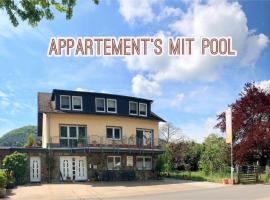 Residenz Moselzauber - Ferienwohnungen mit Pool Landschaft、エルンストのアパートメント