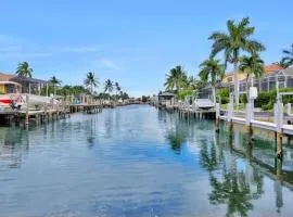 Waterfront home with pool and foosball table
