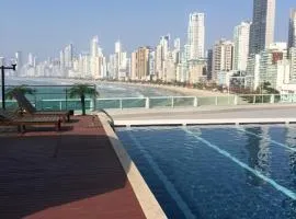 Loft beira-mar/piscina e com estacionamento