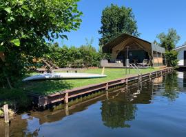 Glamping aan de Plas, отель в городе Винкевен