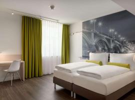 Super 8 by Wyndham Mainz Zollhafen, family hotel in Mainz