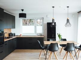 Seeblick & Terrasse! Moderne Ferienwohnung 96qm, hotel in Großräschen