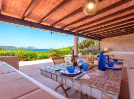 Costa Corallina Villa con spiaggia sotto casa e vista meravigliosa, casa de férias em Costa Corallina