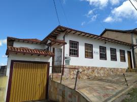 Trilhas de Minas Hostel Camping โฮสเทลในโอว์โรเปรโต