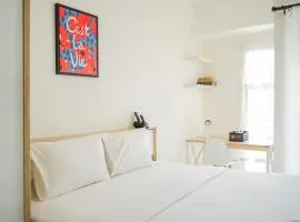 Bright and Cozy Studio Akasa Pure Living BSD Apartment By Travelio