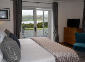 Woodland Lodge, holiday rental in Port na Long