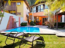 Casa em frente a praia com piscina