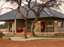 Africa Awaits Lodge & Safaris、Gobabisのシャレー