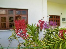 Orchid Sunset Guest House, casă de vacanță din Baie Lazare Mahé