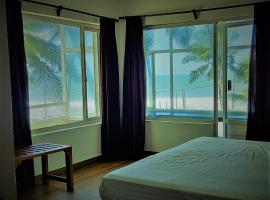 White Shell Beach House: Kannur şehrinde bir otel