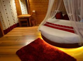 Room in Villa - LakeRose Wayanad Resort, pensionat i Kalpetta