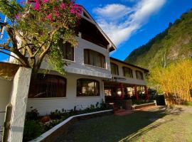 Hotel Volcano Baños, отель в Баньосе